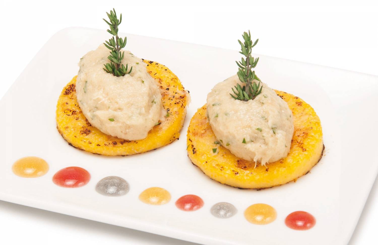 Baccalà Mantecato auf gerösteter Polenta